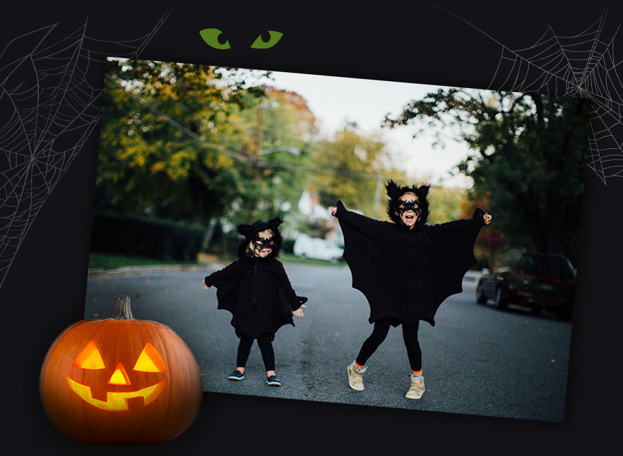 Two children dressed as bats for Halloween 1