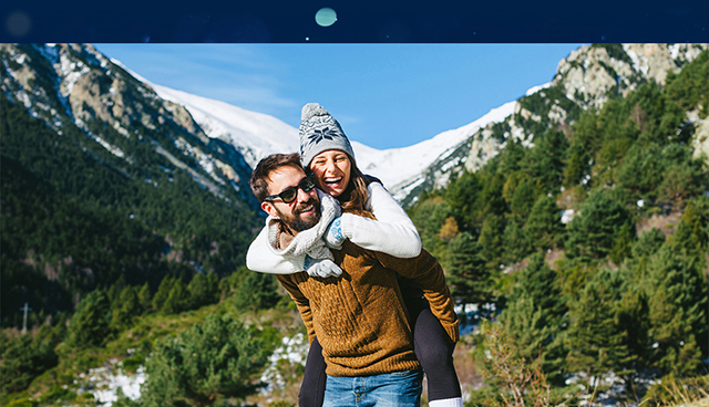 Couple enjoying mountain sun