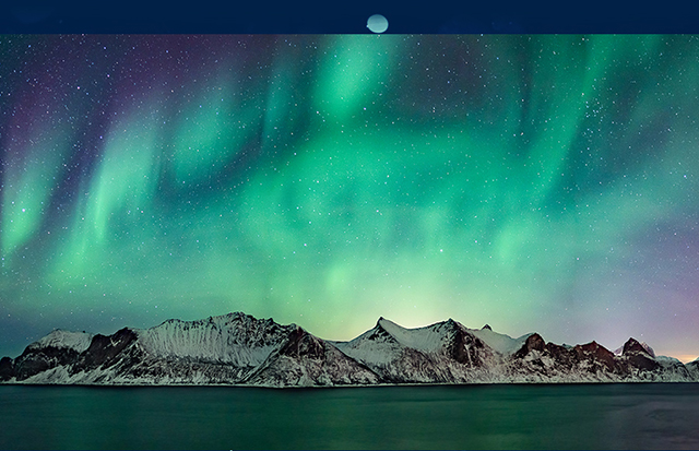 Northern lights behind beautiful mountain range at night Mobile