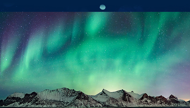 Northern lights behind beautiful mountain range at night